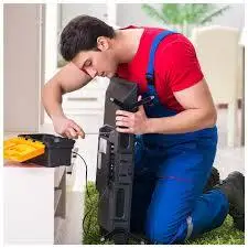 Professional TV repair technician at work